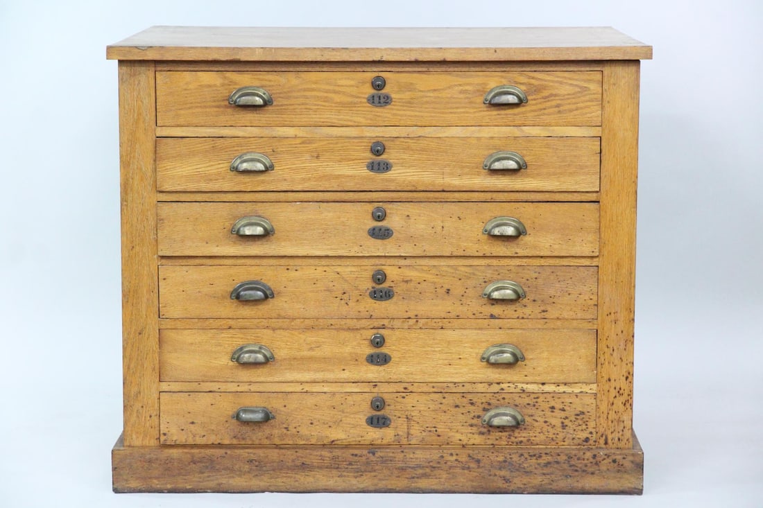Industrial Oak Architect Artist Studio Flat File: Industrial Oak & Brass Architect or Artist Flat File. Large 6 drawer oak flat file cabinet for storing works on paper, with brass pulls and numbered drawers. Please note this cabinet is open in the ba