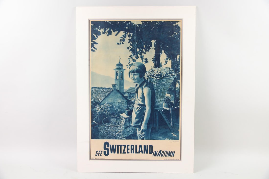 Vintage Travel Poster Switzerland in Autumn: Vintage Travel Poster Switzerland in Autumn, all in blue tones like a Cyanotype. Dimensions are 34 in h x 24 in w x .1 in d. Condition is fair, surface tear bottom left corner, creases horiz and vert 