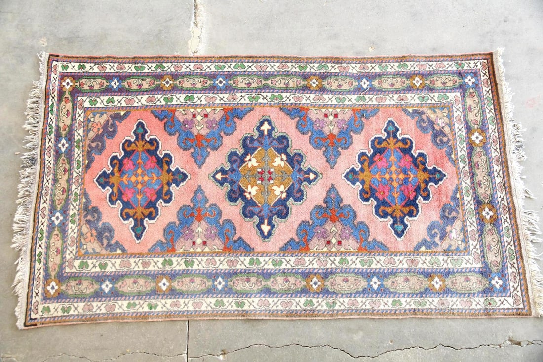 Turkish Oushak Geometric Wool Rug, Pink & Blue: Pink & Blue Turkish Oushak Geometric Wool Rug. This wool rug features bold geometric patterning with three diamond-shaped central medallions across a pale pink field. Dimensions are 98 in l x 53.5 in