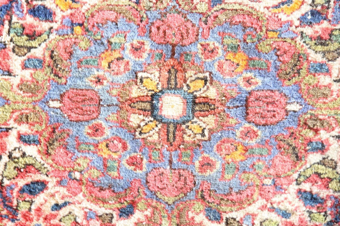 Colorful Persian Kerman Rug, Floral: Colorful Persian Kerman Rug, Floral. A Persian mat with strong symmetry and curvilinear floral designs. Woven with light-catching wool in clear, vivid colors of blue, orange, pink, and deep red.Dimens