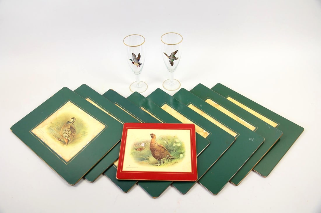 Gamebird Lot, 2 Painted Glasses & 9 Lady Clare Placemats: Hunting Lodge Gamebird Lot of 2 Painted Glasses & 9 Lady Clare Placemats. Includes 2 hand painted pilsner glasses decorated with waterfowl in flight and gilt trim, as well as 9 Lady Clare placemats de