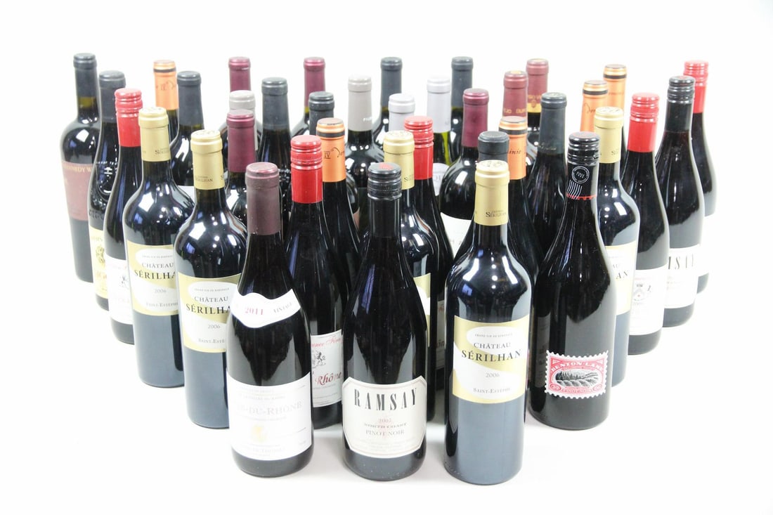 Collection of 38 Unopened Bottles of Wine: Collection of 38 Unopened Bottles of Wine. Includes bottles from France, Italy, Spain and the US. Most are red wines such as Cabernet Sauvignon, Cotes du Rhone, Pinot Noir and more, as well as 2
