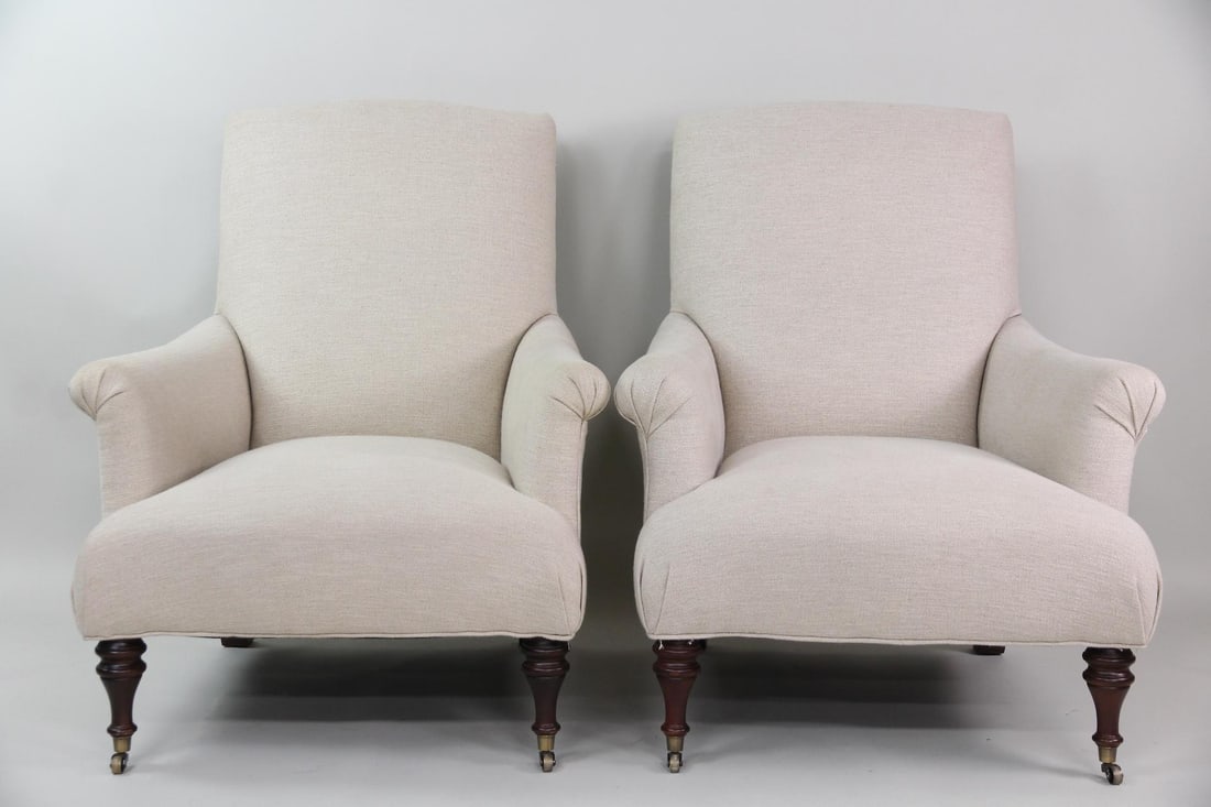 Pair of John Derian Linen Upholstered Fritillaria Chairs: Pair of John Derian Linen Upholstered Fritillaria Chairs. Matching pair of elegant chairs, upholstered in flax colored linen and with turned legs on casters.Dimensions are 39.5 in h x 32 in w x 36.5 i