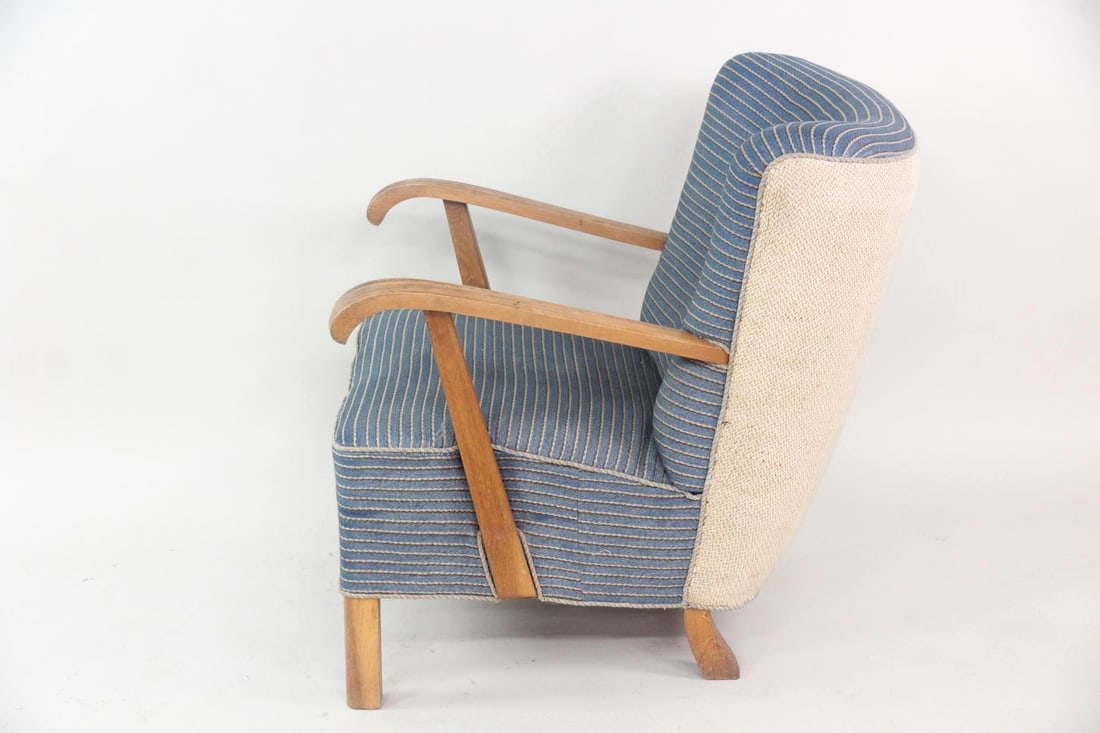 Pinstriped Upholstery Wood Arm Lounge Chair by Fritz Hansen: Mid Century Modern Two-Toned Lounge Chair believed to be designed by Fritz Hansen. A comfortable, low slung chair with light wooden frame and denim blue & gray pinstriped upholstered seats. It has a c