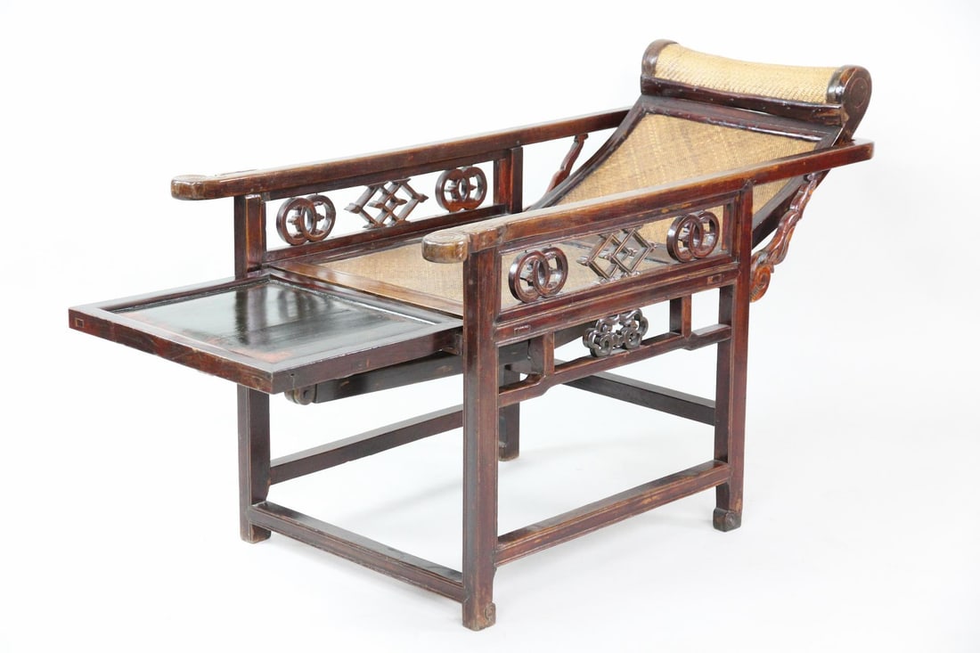 Chinese Wood & Rattan Reclining Moongazing Chair: Chinese Wood & Wicker Reclining "Moongazing" Lounge Chair. A reclining armchair with integrated pull-out leg rest, which transforms the chair into a chaise lounge. It has a cylindrical headrest and tr