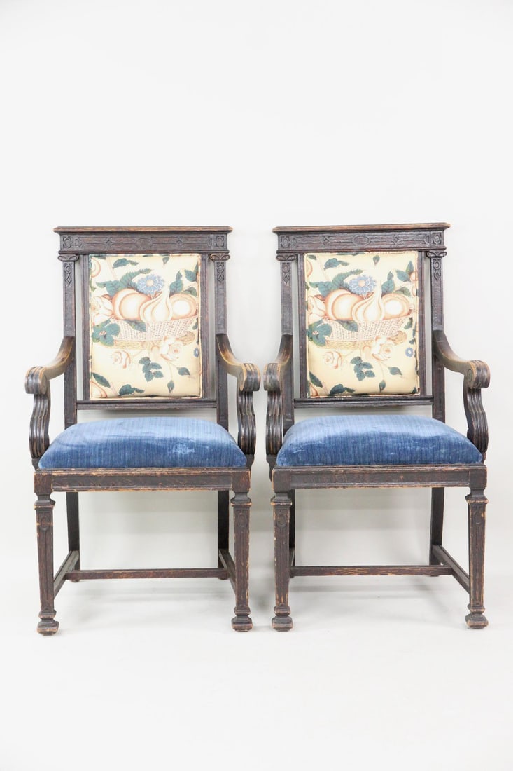 Pair of Georgian Carved Library Chairs, Blue Velvet Upholstery: Pair of Georgian Carved Wood Library Chairs, Blue Velvet Upholstery. A handsome pair of chairs with intricate carving to the backs and scrolled arms. Seats with blue velvet upholstery, backrest & cush