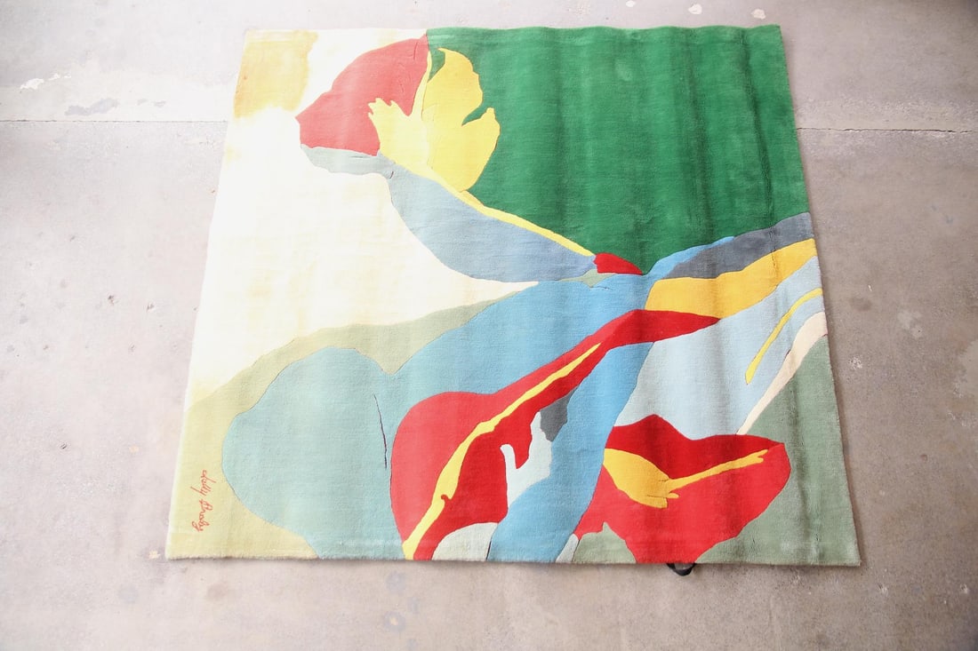 Abstract Tufted Wool Rug, Signed, 8 x 8 Ft: Abstract Tufted Wool Rug, Signed. A hand-tufted wool rug with an abstract pattern suggestive of botanicals in bright primary red, yellow, blue, and green. Very thick, soft pile. Signed to the bottom