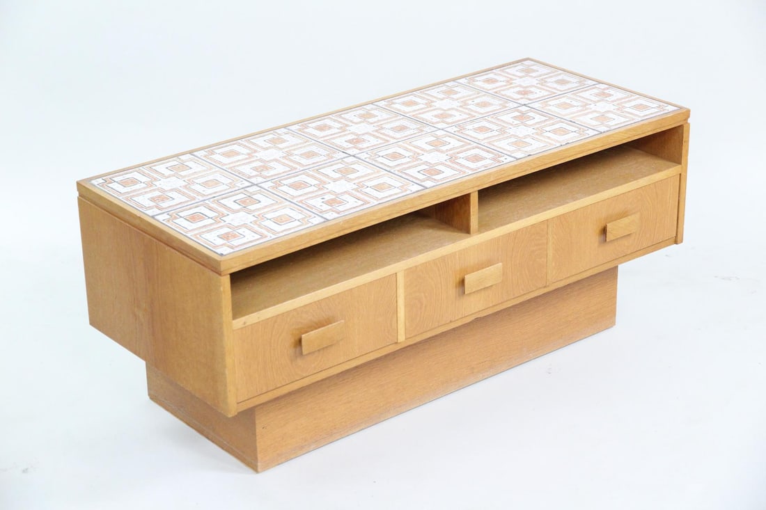 Danish Modern Tile Top Cubist Stand: Danish Modern Tile Top 3-Drawer Stand. This mid century modern low stand would be good night stand or tv stand. It has 3 drawers. It has a paper label from Bredelboro.Dimensions are 18 in h x 40.75 in