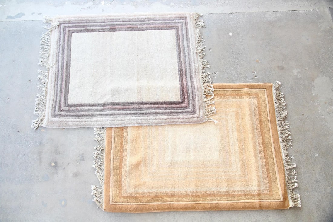 Pair of Minimalist Color Field Rugs, Wool & Linen: Pair of Minimalist Color Field Rugs, Wool & Linen. This is a pair of handwoven rugs, both with tiered borders, in shades of pale violet & orange. Plush and dimensional, with dense wool on a linen