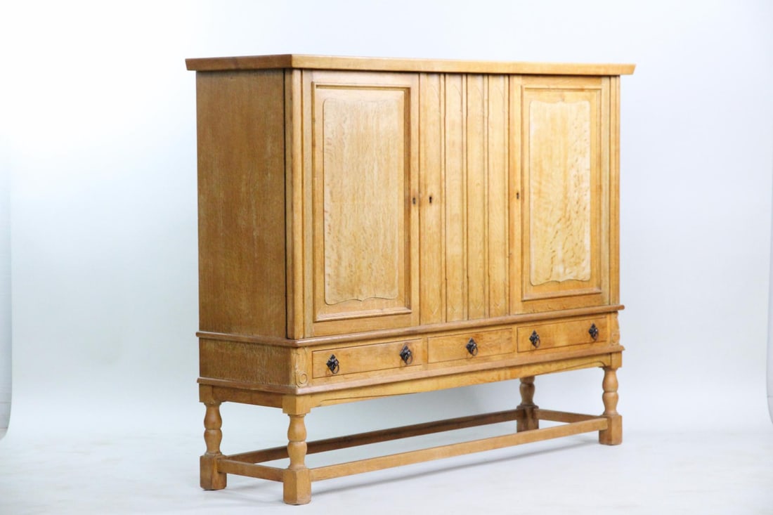 Danish Modern Oak Highboard Cabinet, Henning Kjaernulf: Danish Modern Oak High Sideboard Cabinet, Henning Kjaernulf. This mid century modern cabinet is made of oak, it has three doors and drawers. We believe to be designed by Henning Kjaernulf.Dimensions a