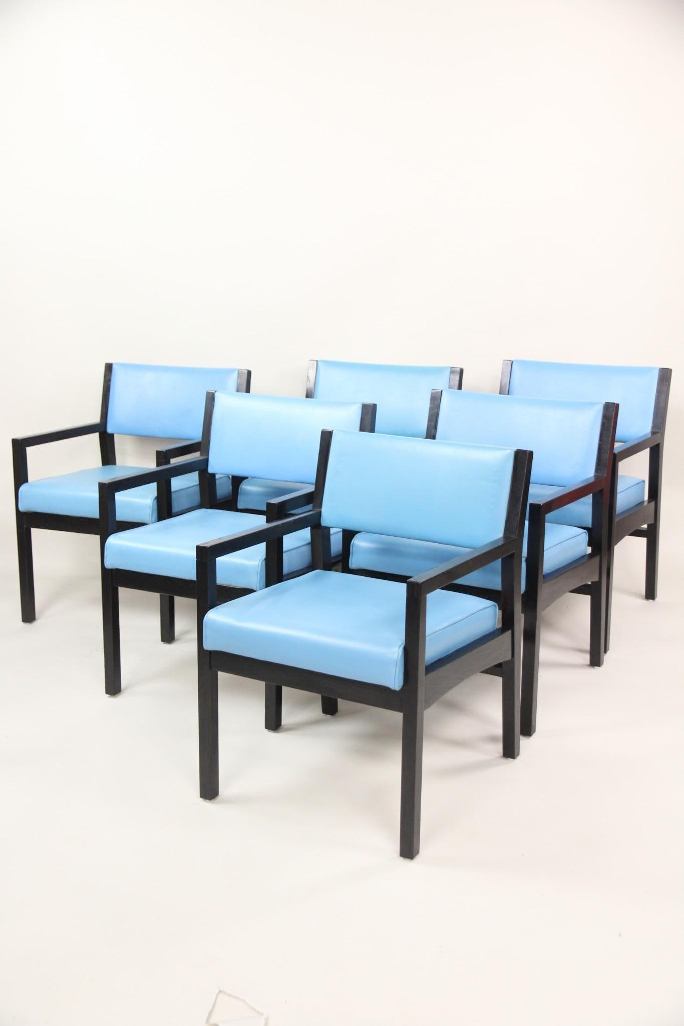 Set of 6 Mid-Century Modern Blue & Black Armchairs: Set of 6 Mid-Century Modern Blue & Black Armchairs, Bertolini Seating. This set of armchairs have square profiles and straight lines, with ice blue vinyl cushions and black wood frames. With