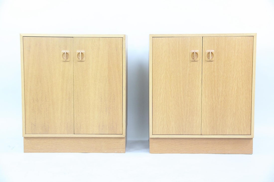 Pair of Danish Oak Nightstands: Pair of Danish Oak Nightstands. Matching pair of nightstands in golden oak, each with 2 doors. Made in Denmark sticker attached. Dimensions are 28 in h x 24 in w x 15.75 in d. Condition is good