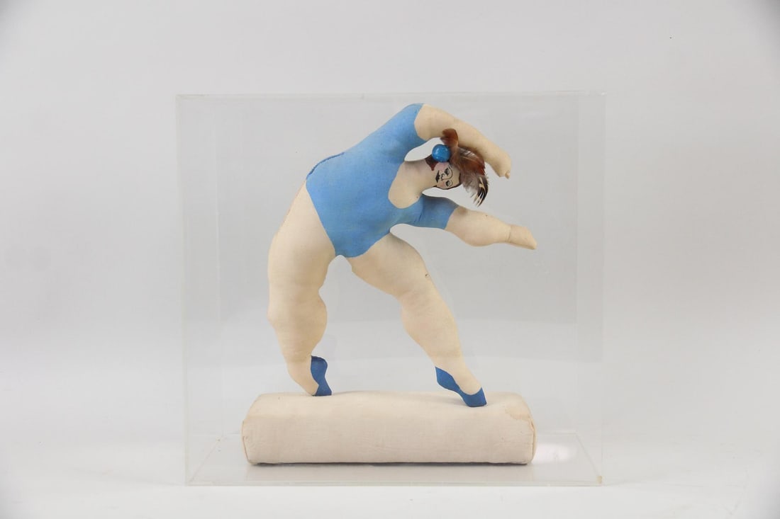 Modern Soft Fabric Sculpture of a Female Dancer, Signed: Modern Textile Art, Soft Sculpture of a Female Dancer. This is a fabric sculpture of a female dancer or gymnast with blue painted or dyed leotard & shoes. Displayed on a simple fabric base inside a cl