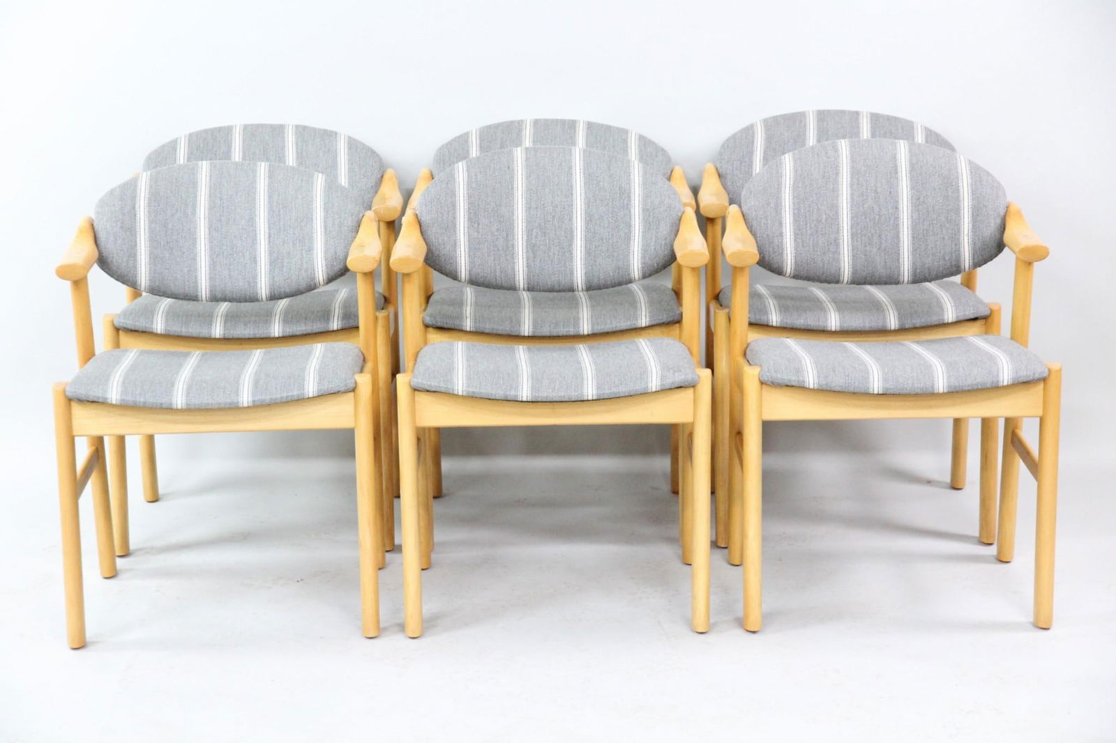 Set of 6 Danish Modern Dining Arm Chairs, Blonde & Gray: Set of 6 Danish Modern Dining Chairs, Blonde & Gray. Matching set of 6 arm chairs with blonde wood frames and gray and white striped upholstered seats and backs. Unusual short arm rests.Dimensions are