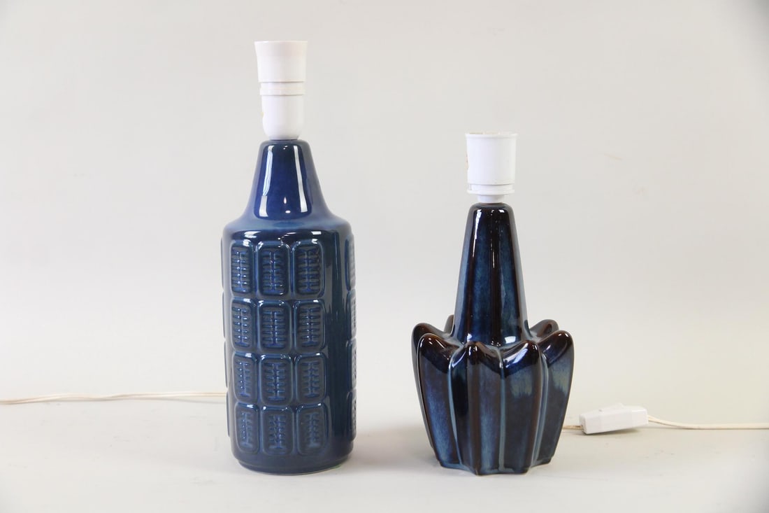 Pair of Stentoj Soholm Table Lamps, Stoneware: Pair of Mid-Century Modern Stentoj Soholm Table Lamps, Ceramic Stoneware. This pair of table lamps feature sculptural forms, with one having an embossed pattern and one with distinct star-shaped