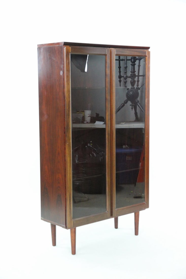 Danish Modern Rosewood Glass Front Cabinet: Danish Mid Century Modern Rosewood Glass Front Cabinet. Nice bookcase or curio cabinet. Two glass door with glass shelves, the shelves have a wood trimmed front edge. It has a Made in Denmark mark on