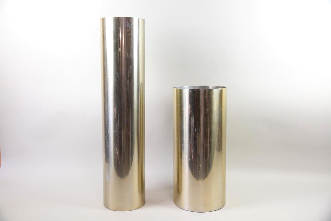Pair of Cylindrical Umbrella, Plant Stands, Gold Metal: Pair of Mid-Century Modern Umbrella, Plant Stands, Gold Metal. A pair of umbrella stands, plant stands, or decorative vessels with a cylindrical shape and reflective gold colored finish. Dimensions of