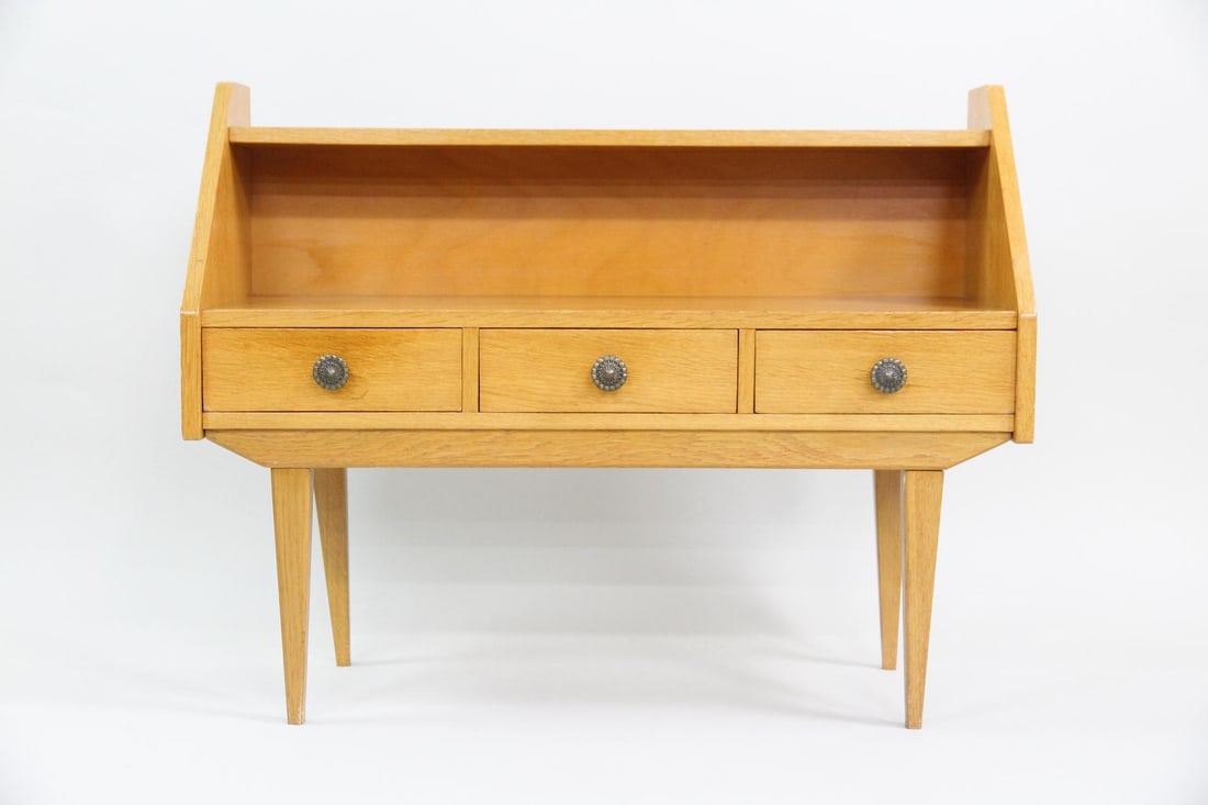 Danish Modern Triangular Night Stand: Danish Mid Century Modern Triangular Night Stand. This mid century modern night stand has very cool angular design, with triangle shaped main section.Dimensions are 24.75 in h x 32 in w x 12 in d. Con