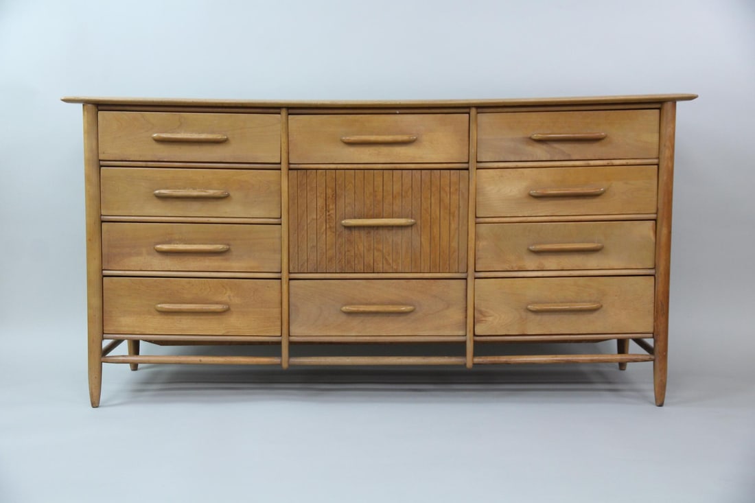 Mid-Century Modern Lowboy Dresser: Mid-Century Modern Lowboy Dresser. Nice looking design with textured center.Dimensions are 32.5 in h x 65 in w x 20 in d. Condition is good with minor scuffing throughout. Drawers slide well with one