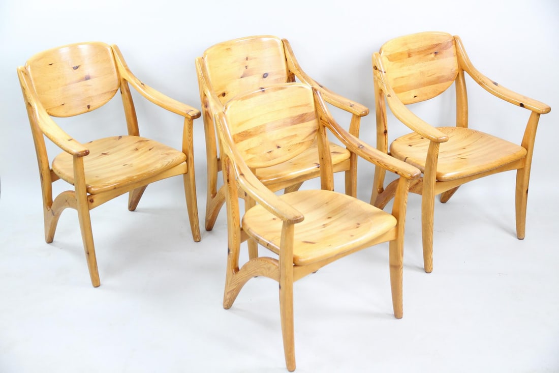 Set of 4 Mid Century Modern Pine Arm Chairs, Style of Rainer Daumiller: Set of 4 Mid Century Modern Pine Arm Chairs, Style of Rainer Daumiller. No makers mark anywhere. These pine armchairs are much in the style of Rainer Daumiller, the grain of the wood, the design and t