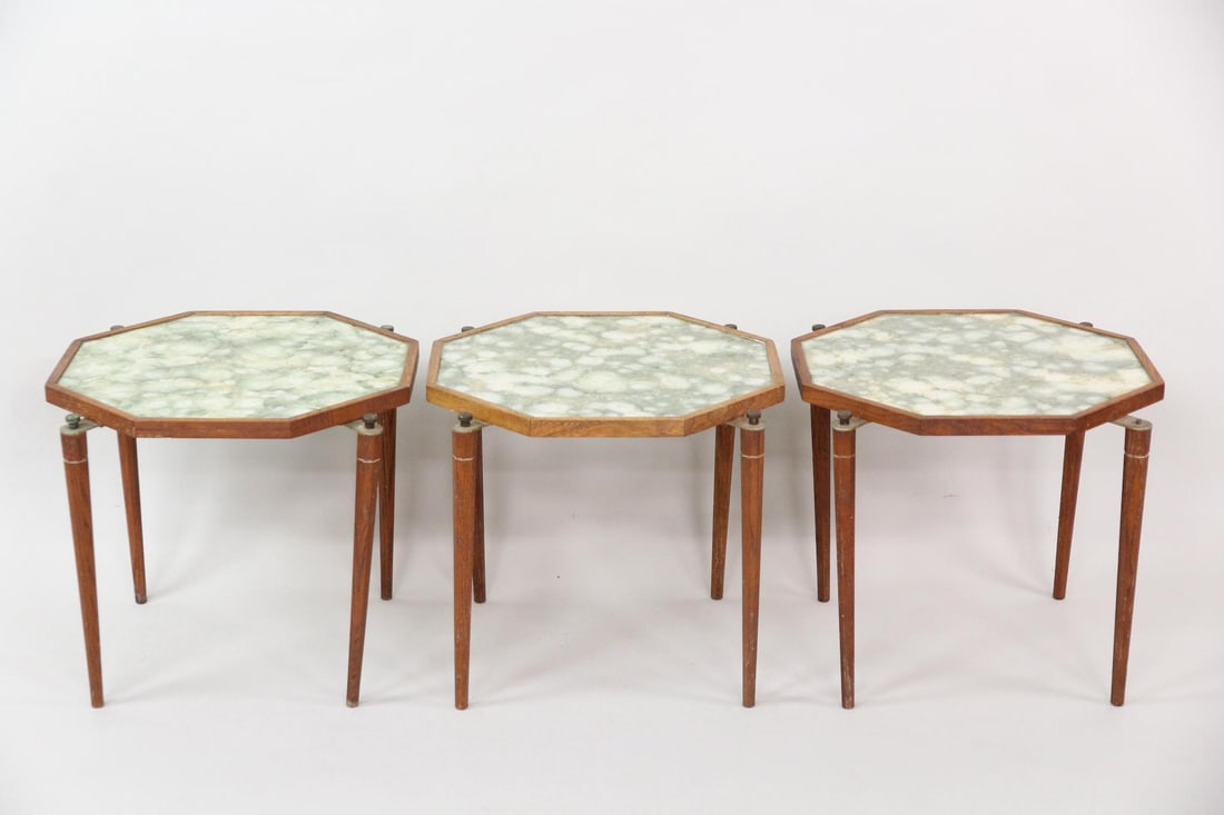 Set of 3 Octagonal Nesting Tables, Reverse Painted Glass: Mid-Century Modern Set of 3 Octagonal Wooden Side Tables, Reverse Painted Glass. A lovely set of stacking tables with thin, tapered legs. The glass tops are reverse painted in shades of green.Dimensio
