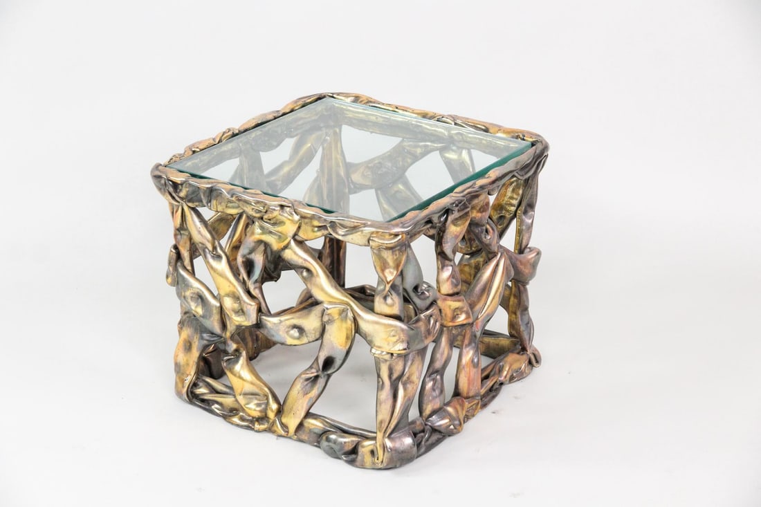 Postmodern Gilded & Glass Ribbon End Table: Postmodern Gilded Resin & Glass Ribbon End Table, Style of Tony Duquette. A dynamic table composed of textural "ribbons" made of gilded metal and a square glass top. Unmarked, in the style of Tony Duq