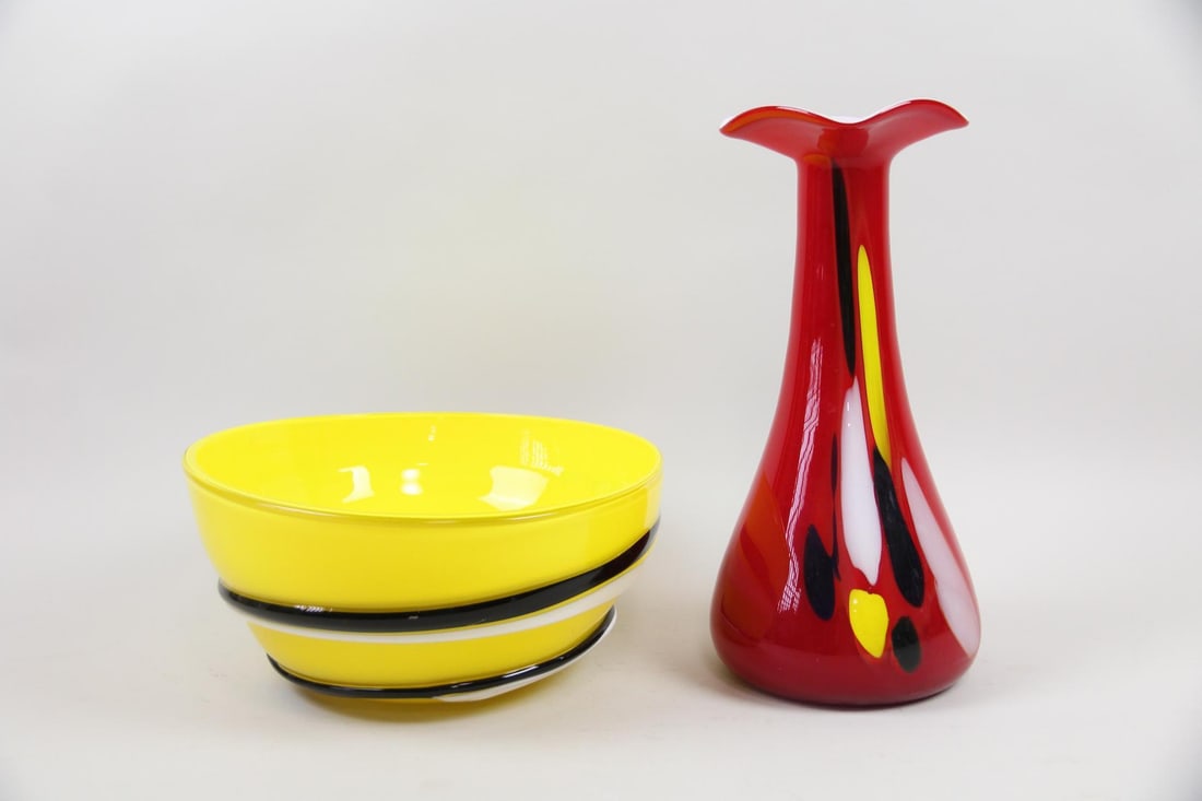 Lot of 2 Colorful Mid-Century Modern Art Glass, Bowl & Vase: Lot of 2 Colorful Mid-Century Modern Art Glass, Bowl & Vase. Two handblown art glass vessels in vibrant colors, including a large yellow bowl with black & white swirl and red vase with yellow, white