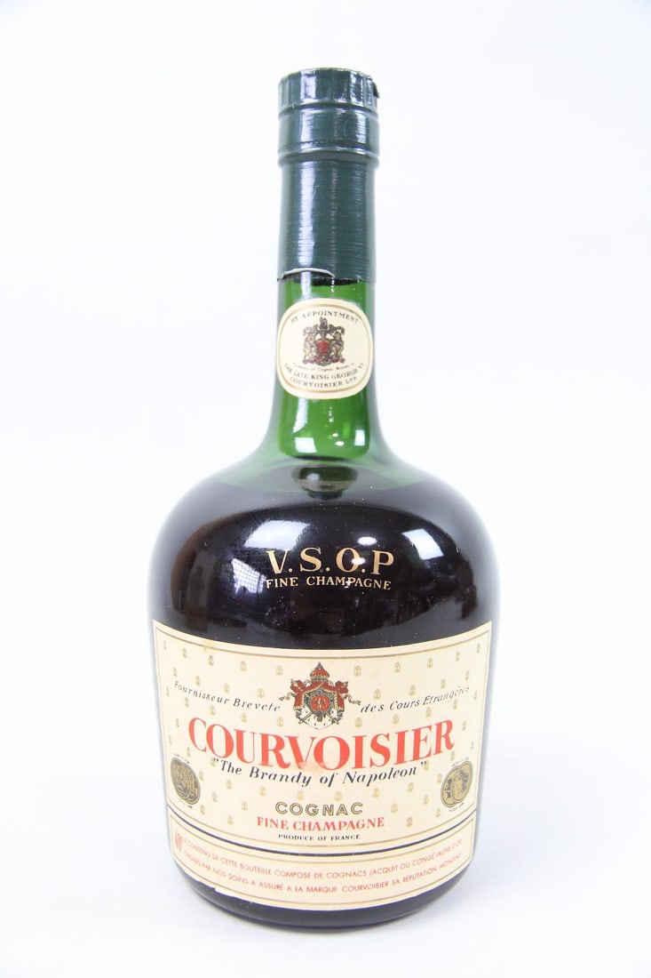 Unopened Bottle of Courvoisier Cognac, Napoleon Box: Unopened Bottle of Courvoisier Cognac, Original Napoleon Box. This is an unopened bottle of Courvoisier Cognac in its original packaging, notated on box "The Brandy of Napoloeon". Dimensions of box