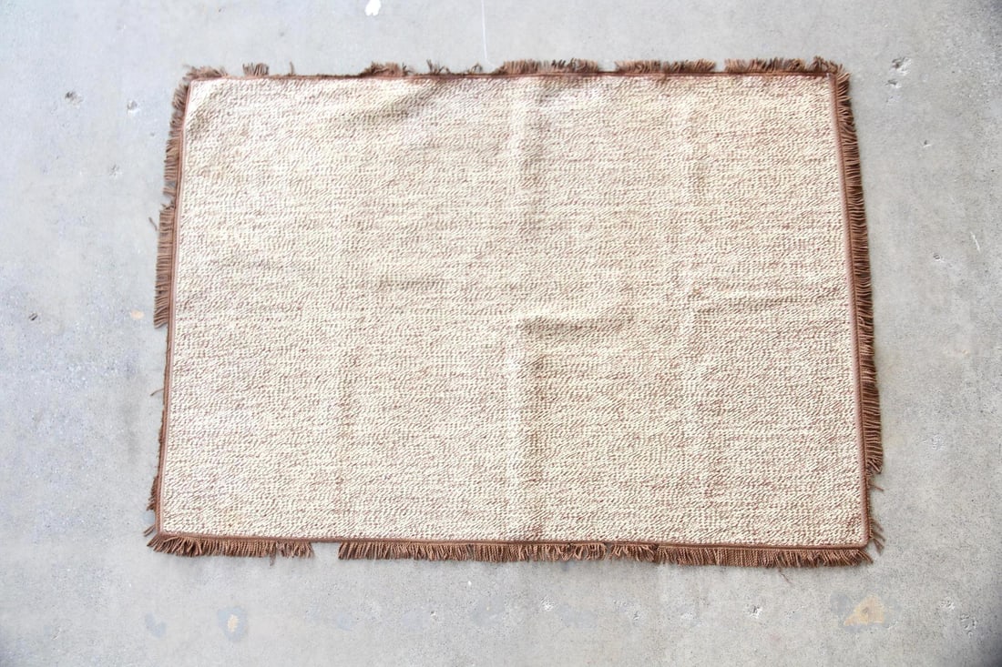 Farmhouse Rag Rug, Cotton with Brown Fringe: Farmhouse Rag Rug, Cotton with Brown Fringe. A farmhouse style rag rug made of twill woven cotton in cream, brown, and red with brown fringed trim. Dimensions are 73 in h x 51.5 in w. Condition of