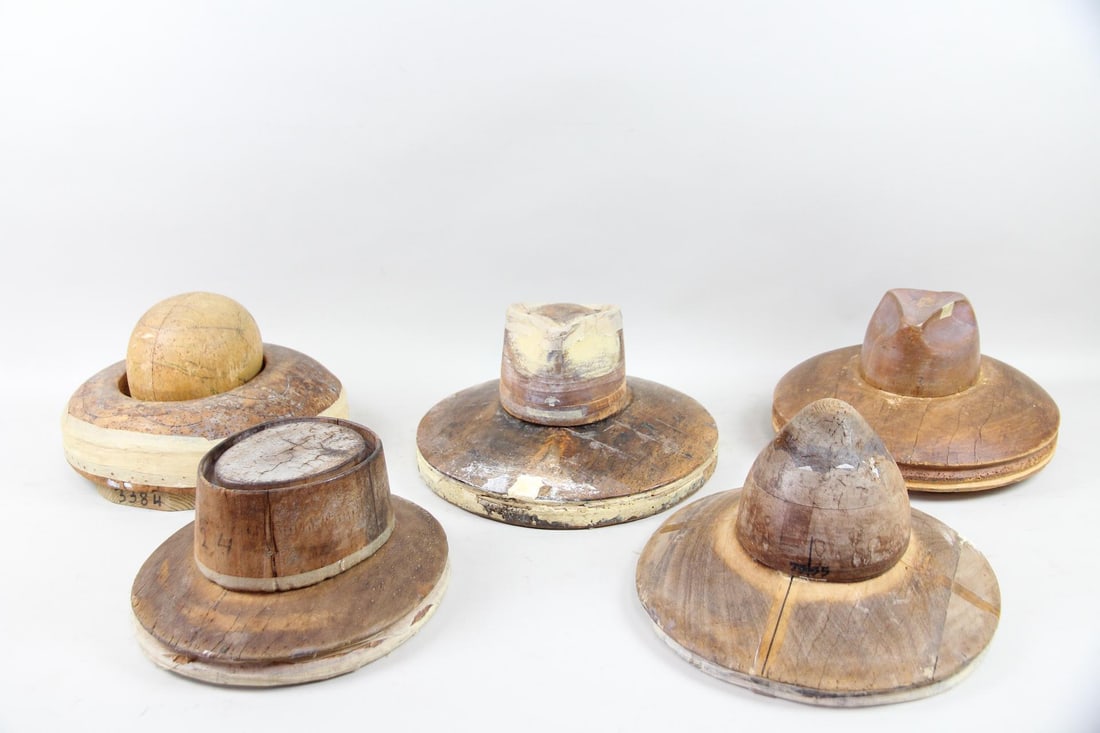 Lot of 5 Wooden Millinery Factory Hat Blocks with Wide Brims: Lot of 5 Industrial Sculptural Wooden Millinery Factory Hat Blocks, Forms with Wide Brims. Five wooden millinery hat blocks, used by hat makers to shape felt or straw hats. Hand-carved from wood with