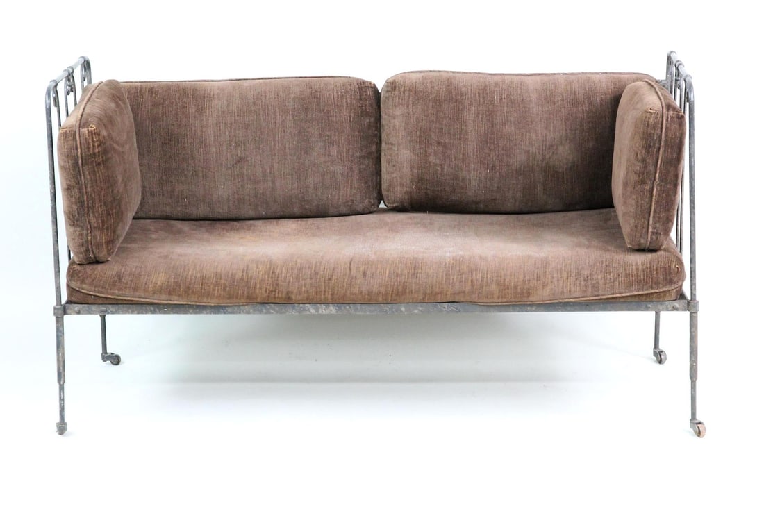 French Cast Iron Daybed, Velvet Cushions: French Cast Iron Daybed, Velvet Cushions. A beautiful cast iron daybed featuring ornate railings and castors. Fitted with brown velvet cushions. Dimensions are 33 in h x 59.5 in w x 24 in d. Seat heig