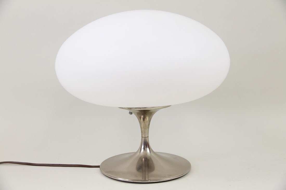 White Laurel Mushroom Lamp, B. Curry: Mid-century Modern White Laurel Mushroom Lamp, B. Curry. Simple, iconic design features a large, white frosted glass globe atop a distinctive tulip-shaped metal base. The bottom is stamped "US PAT
