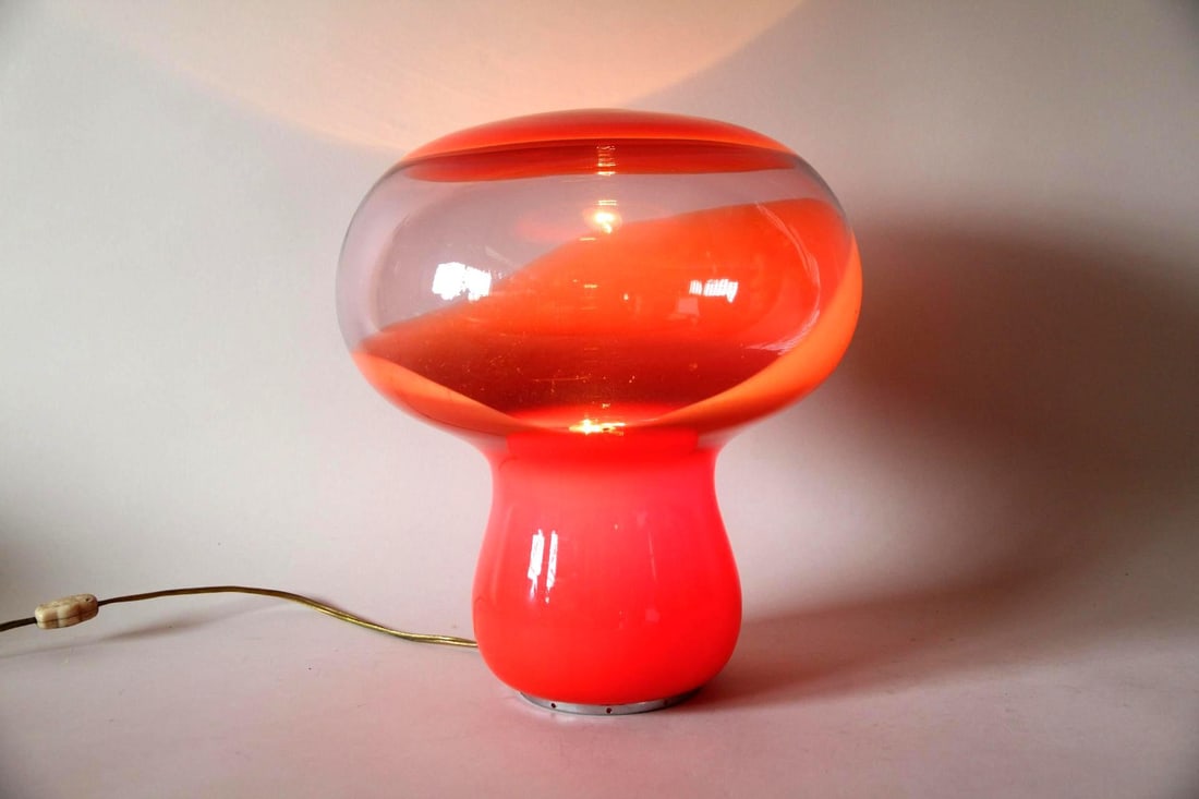 Space Age Murano Glass Mushroom Lamp, Vistosi: Mid-century Modern Murano Mushroom Lamp, Vistosi. This small, mushroom-shaped lamp is made of hand blown persimmon and transparent glass. Attributed to Gino Vistosi. Dimensions are 12 in h x 11 in w