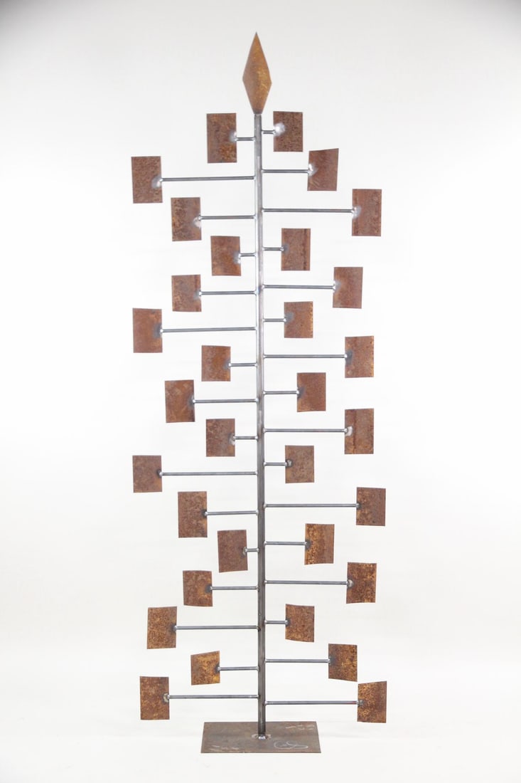 Tall Abstract Metal Sculpture After Harry Bertoia: Tall Organic Abstract Metal Sculpture After Harry Bertoia. Metal sculpture in the style of Harry Bertoia with oxidized sheet metal plates branching out from a central stem. Dimensions are 95 in h x 34