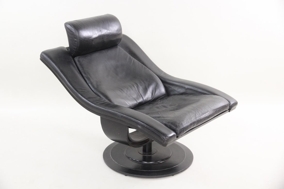 Takashi Okamura & Erik Marquardsen Leather Swivel Chair: Mid-century Modern Takashi Okamura & Erik Marquardsen for Nelo Leather Chair. This is the "Move" swivel armchair in black leather by Takashi Okamura & Erik Marquardsen. It features a sleek, curved fra
