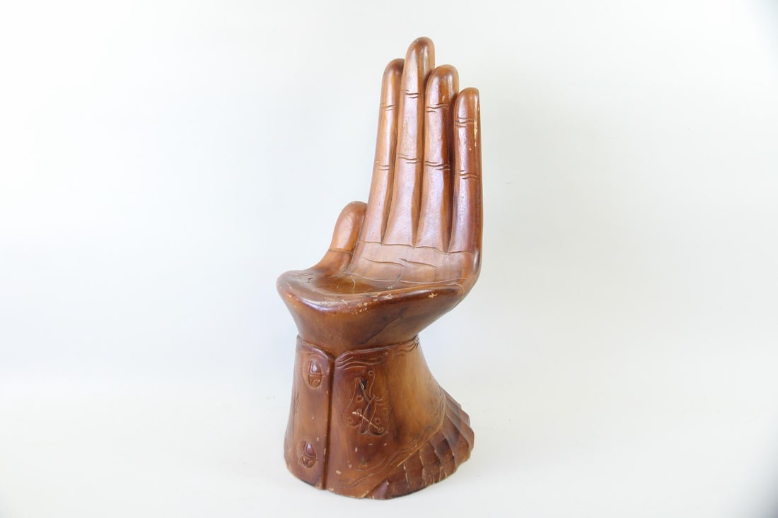 Sculptural Carved Wooden Stool, Form of a Hand: Sculptural Carved Wooden Stool or Stand, Form of a Hand. This is a petite carved and polished chair or stand in the shape of a cupped hand. It has whimsical etched floral and butterfly designs at the 
