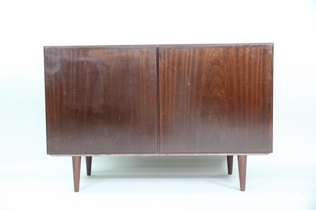 Omann Jun Rosewood Sideboard Cabinet, 1 of 2: Danish Mid-Century Modern Gunni Omann for Omann Jun Rosewood Sideboard Credenza Cabinet, 1 of 2. Minimalist cabinet veneered in attractive rosewood with 2 doors, shelves and 2 felt lined drawers for s