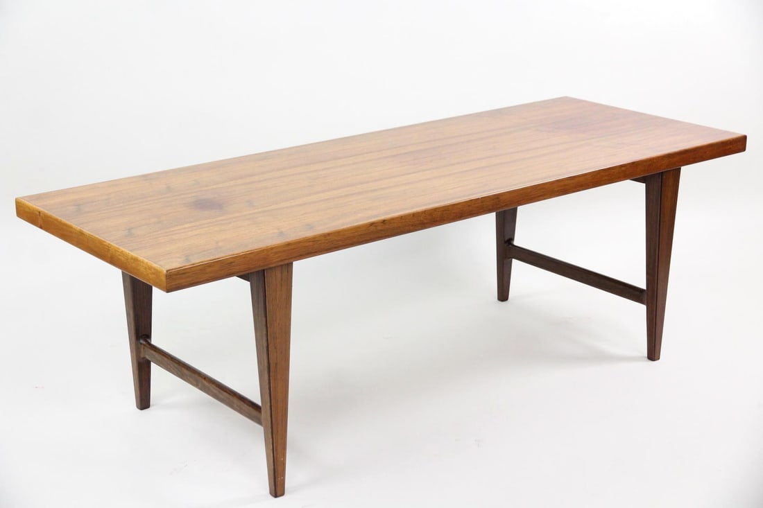 Danish Modern Rosewood Coffee Table, Edmund Jorgensen: Danish Modern Rosewood Coffee Table, Edmund Jorgensen. A coffee table with clean lines and tapered legs, made of rosewood. Unmarked, we believe this is by Edmund Jorgensen. Dimensions are 20.75 in h x