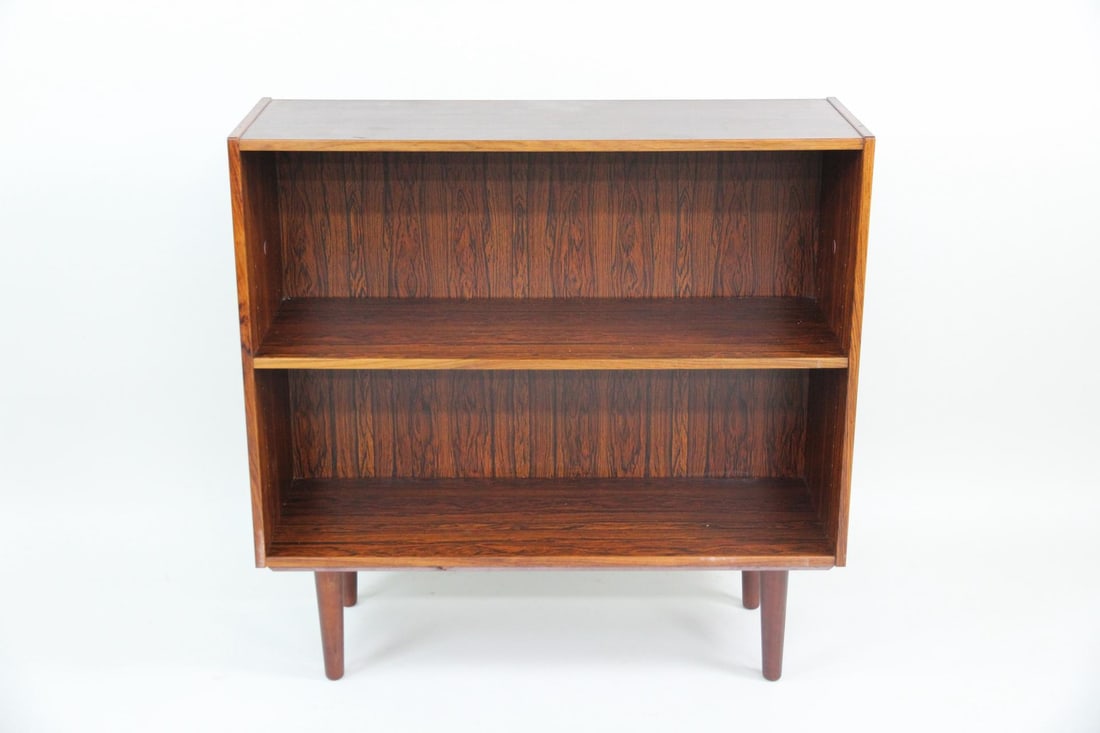 AEJM Møbler Rosewood Bookcase: Danish Mid-Century Modern AEJM Møbler Rosewood Bookcase. One shelf minimalist bookcase veneered in attractive rosewood. AEJM Møbler A/S label attached. Dimensions are 34.5 in h x 35.5 in w x 12 in