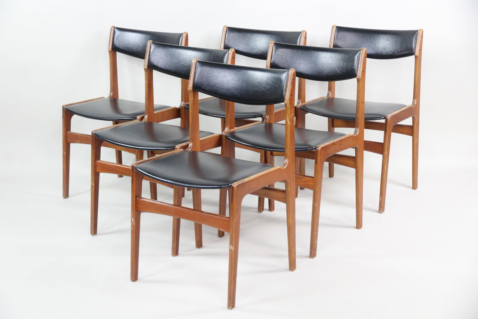 Set of 6 Black Vinyl & Wood Dining Chairs, Erik Buch: Set of 6 Mid-century Modern Vinyl & Wood Dining Chairs, Erik Buch. Matching set of six side chairs with warm-toned wooden frames and black vinyl upholstered seats and backs. Unmarked, we believe these