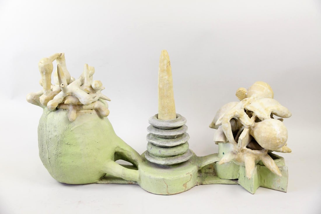 Arnie Zimmerman Stoneware Sculpture, Rings & Pods: Arnie Zimmerman Ceramic Stoneware Sculpture, Untitled, Rings & Pods. This horizontal ceramic sculpture features three abstract masses with a cone & rings in the center. Glazed in pale early green &