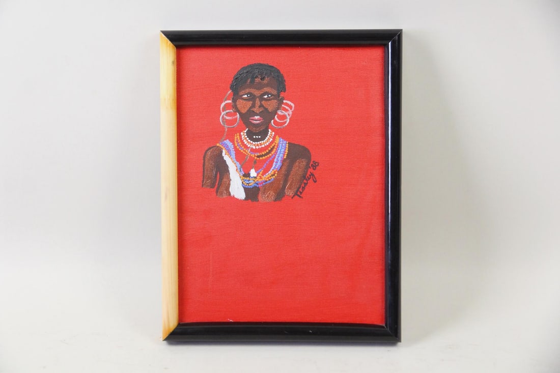 Portrait Painting of a Traditional African Woman, Signed, 1988: Portrait Painting of an African Woman, Signed, 1988. A painting on canvas depicting a woman wearing prominent hoop earrings and beaded necklaces against a vibrant red background. Dated 1988 with artis