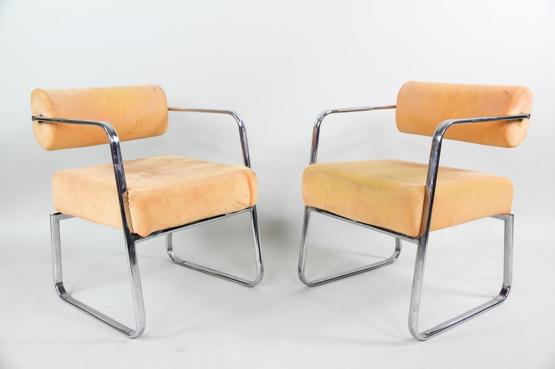 Tubular Chrome Lounge Chairs, Floating Backs: Space Age Tubular Chrome Lounge Chairs, Floating Backs. Cantilever chairs with tubular chrome frames and distinctive floating backs. The seats and backs are upholstered in orange fabric. Dimensions ar