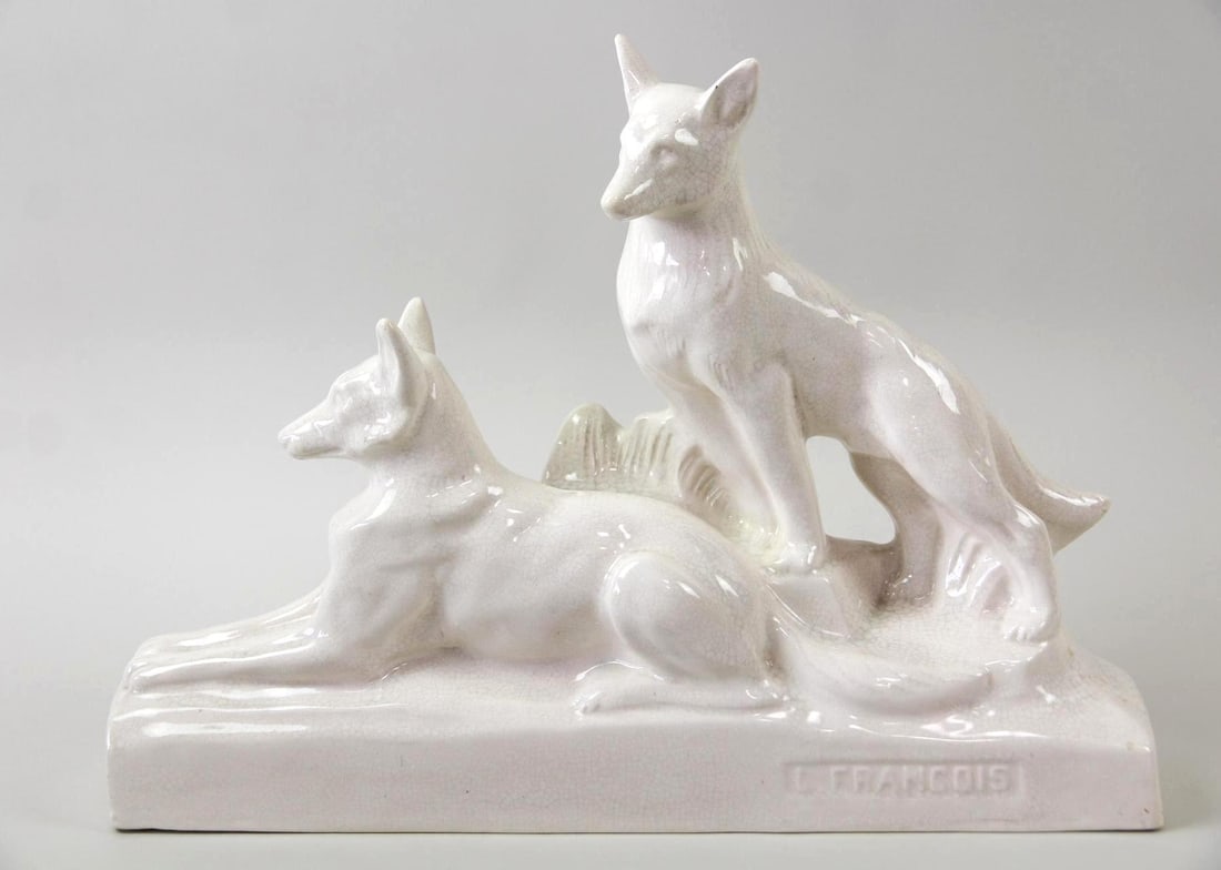 Art Deco Francois Levallois Ceramic Sculpture, Dogs: French Art Deco Francois Levallois Earthenware Sculpture, Dogs. A sculpture depicting two shepherd dogs, in a cream craquelure glaze. Marked "L Francois" to the bottom corner. Dimensions are 12.75 in