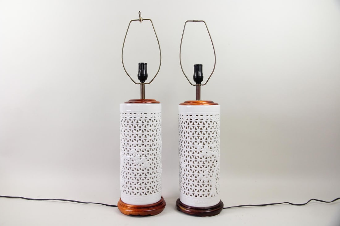 Pair of White Porcelain Chinoiserie Cherry Blossom Table Lamps: Pair of White Porcelain Chinoiserie Cherry Blossom Table Lamps, Blanc de Chine. Featuring cherry blossom motifs atop a triangular reticulated pattern background, and "Meander" pattern bands, these