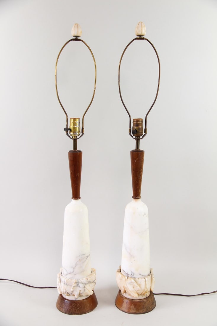 Pair of Alabnaster Marble & Walnut Lamps with Carved Details: Pair of Mid-Century Modern Marble & Walnut Lamps with Carved Details. Matching pair of lamps with white marble bases and carved detailing, walnut necks, and marble finials. Dimensions are 36 in h x