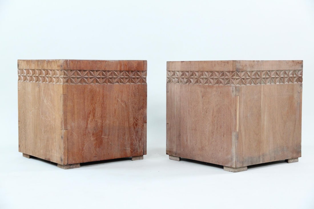 Pair of Solid Mahogany Carved Minimalist Planters: Pair of Solid Mahogany Cubist Carved Minimalist Planters. These are solid wood planters made from Mahogany. They have dirt interiors from being used. Great minimalist geometric carving around the bord