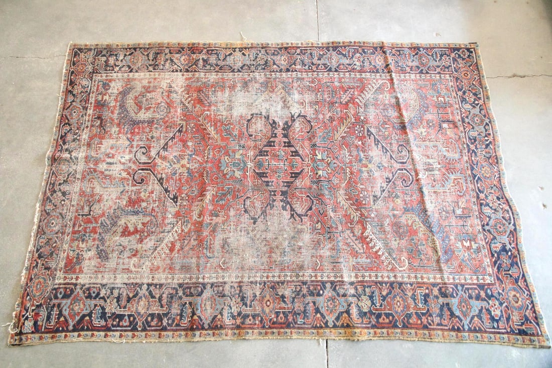 Persian Heriz Rug, Wool & Cotton, 7 x 10.5 Ft: Persian Geometric Heriz Rug, Wool & Cotton, 7 x 10.5 Ft. Area rug with rectilinear geometry and a dominant central medallion, featuring a traditional color palette of soft red, tan, ivory, and blues.