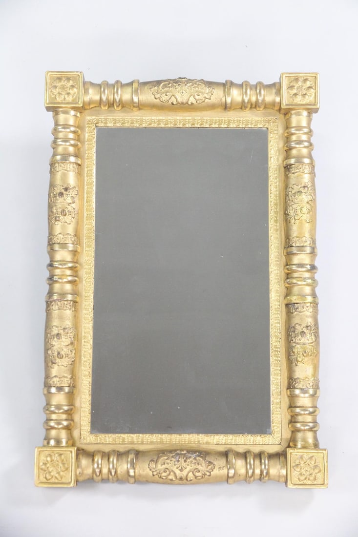 Federal Gold Gilt Mirror, Giltwood, Vertical: 19th C. Federal Neoclassical Giltwood Mirror. Large mirror in a neoclassical giltwood frame, with split baluster sides and floral details. Dimensions are 36.5 in h x 24.5 in w x 4 in d. Condition is