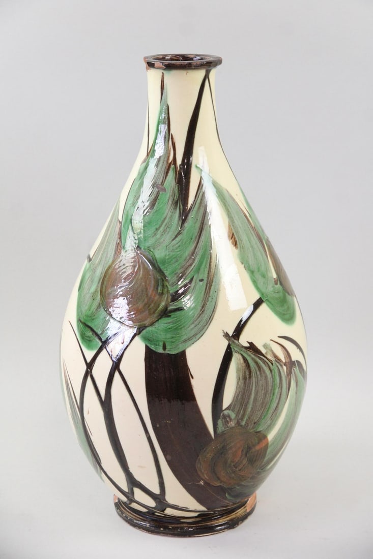 Danish Herman A. Kahler Faience Horn Glazed Floor Vase: Danish Mid-Century Modern Kahler Studio Pottery Floor Vase. Large off-white with brown and green painted foliage earthenware vase. Marked on underside. Dimensions are 17.5 in h x 9 in w x 9 in d. Cond